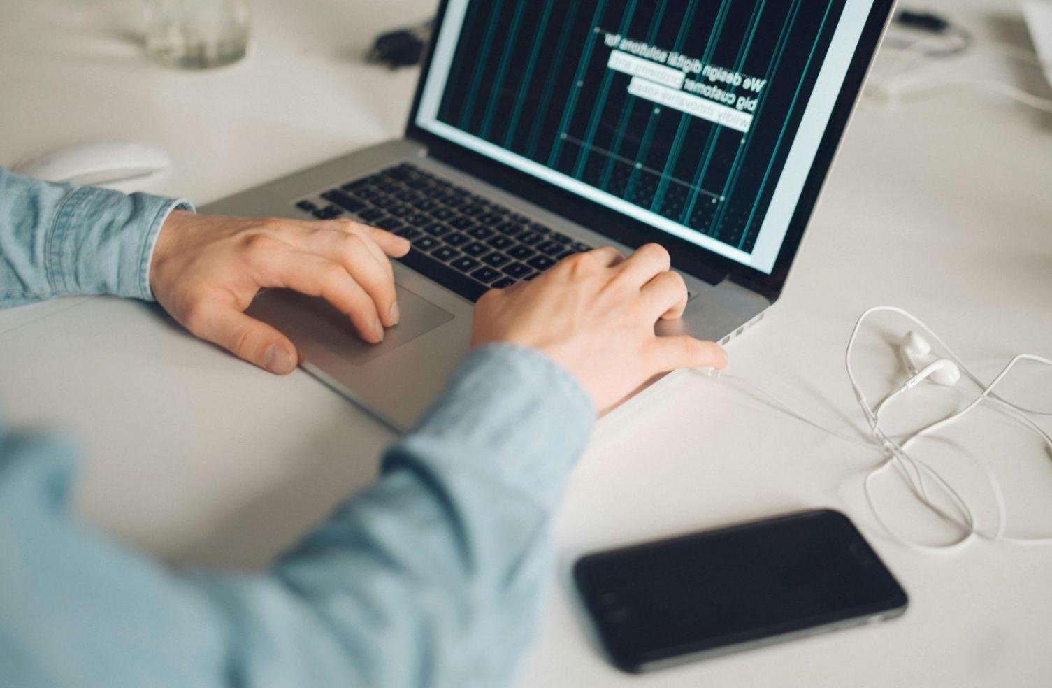 Financial professionals reviewing budget analysis charts and graphs during an interactive workshop session